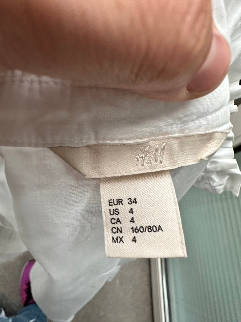 H&M blouse met ruffle wit maat 34