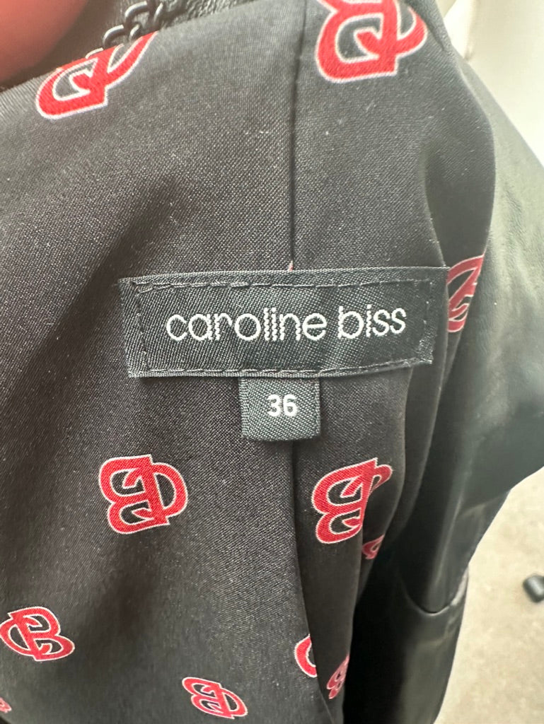 Caroline Biss - Jas - geruit in rood-zwart-wit, asymmetrische rits, kraag van imitatieleer - S