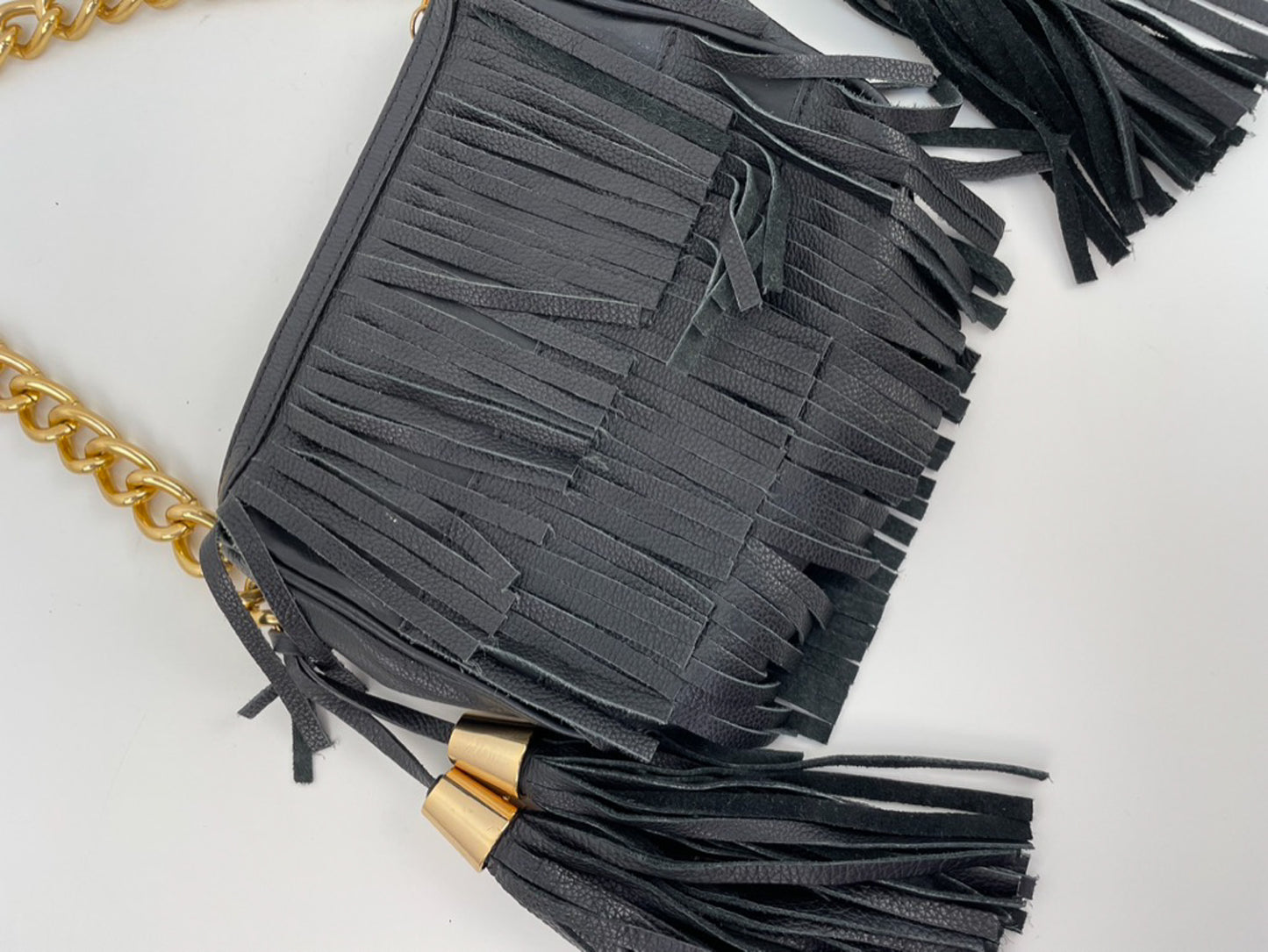 Zara clutch met franjes, tassles en gouden details